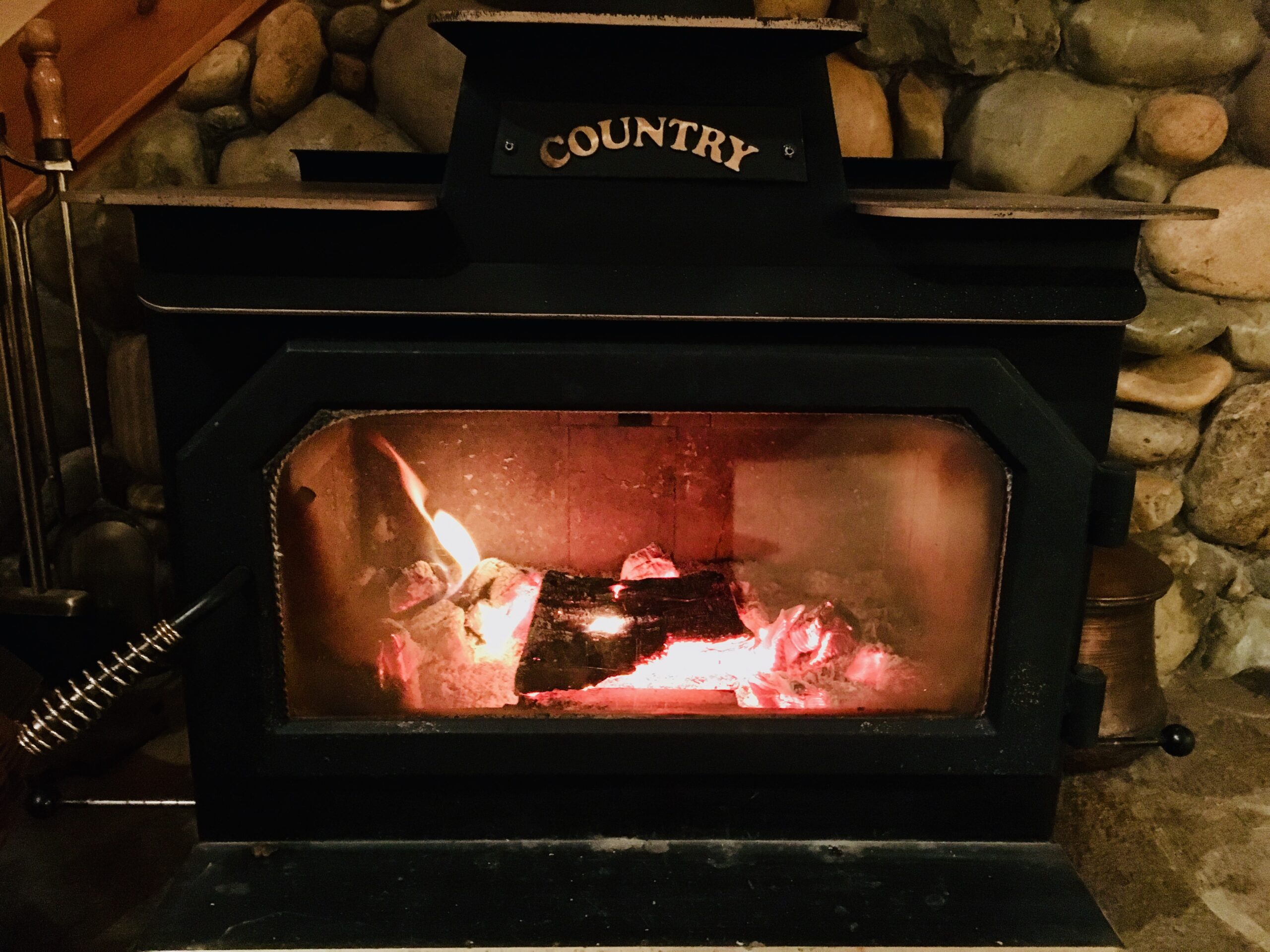 Tahoe Truckee Vacation Rentals cozy fire in wood stove